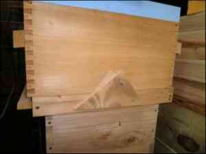 Two screws in bottom board and one in hive body Two screws in bottom board and one in hive body